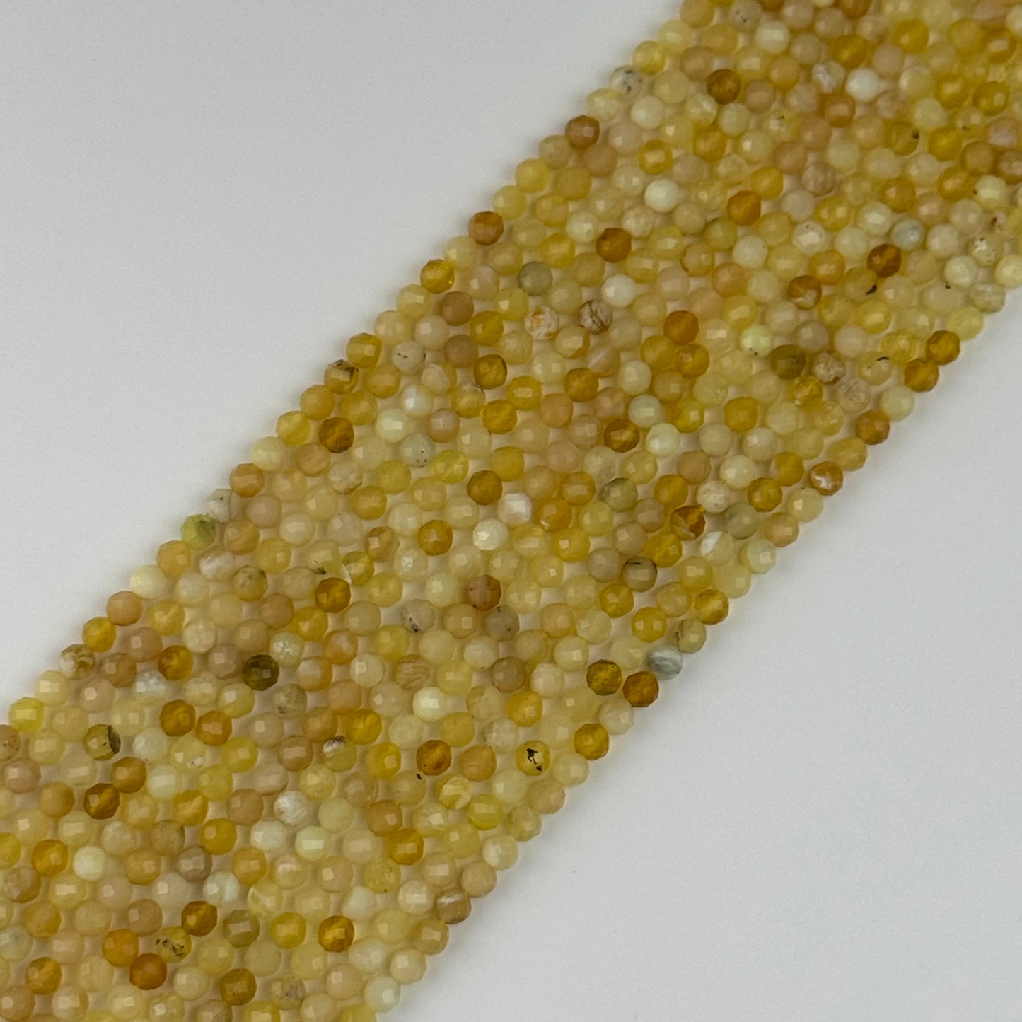 Yellow Opal Faceted Round Beads