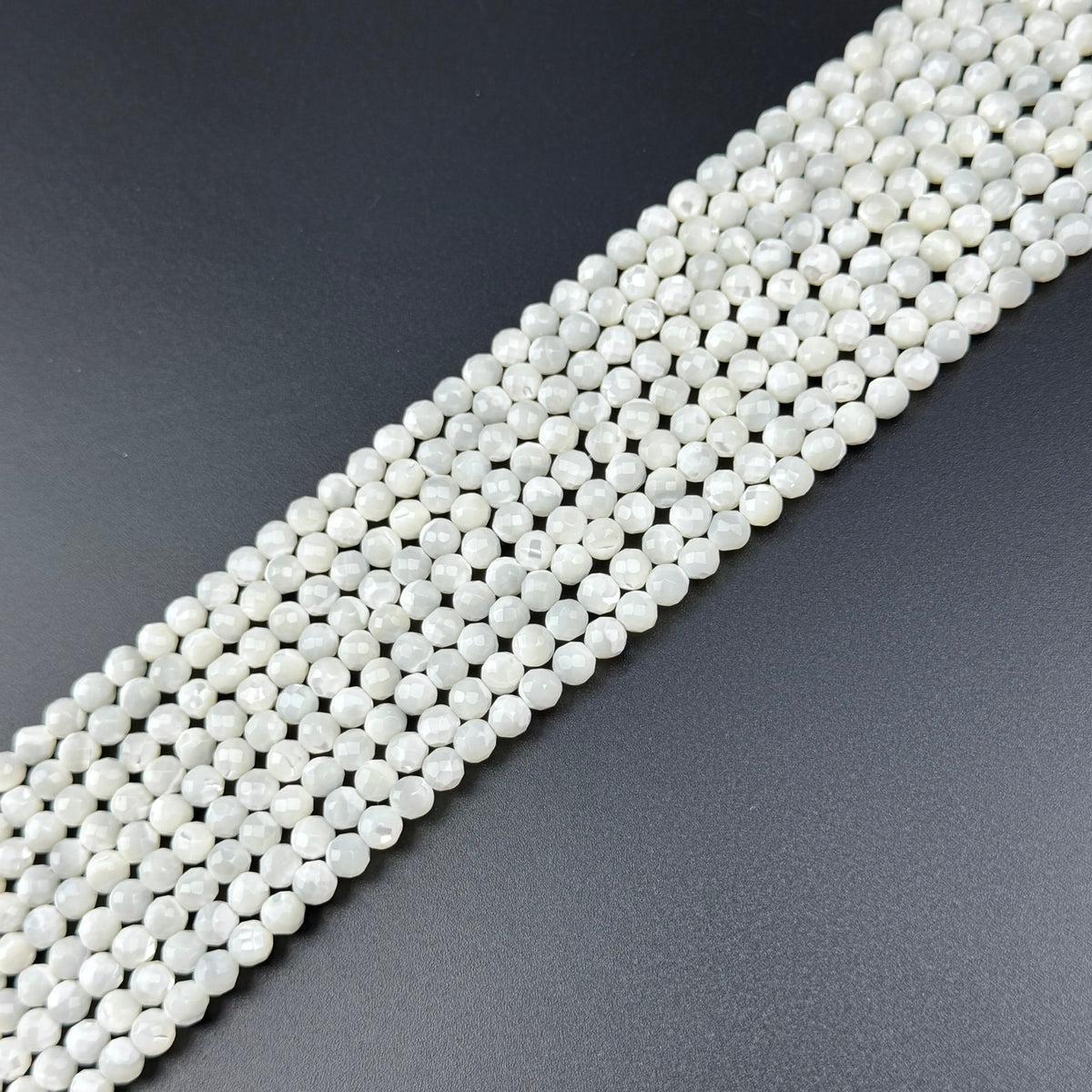White Mother of Pearls Faceted Round Beads