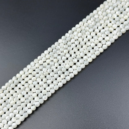 White Mother of Pearls Faceted Round Beads