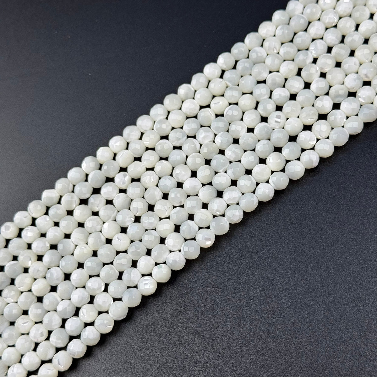White Mother of Pearls Faceted Round Beads