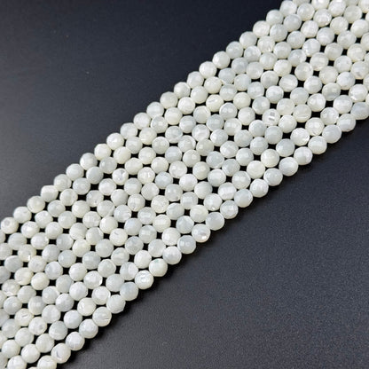 White Mother of Pearls Faceted Round Beads