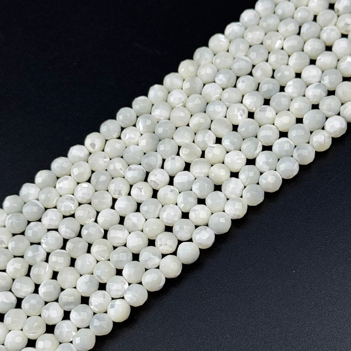 White Mother of Pearls Faceted Round Beads