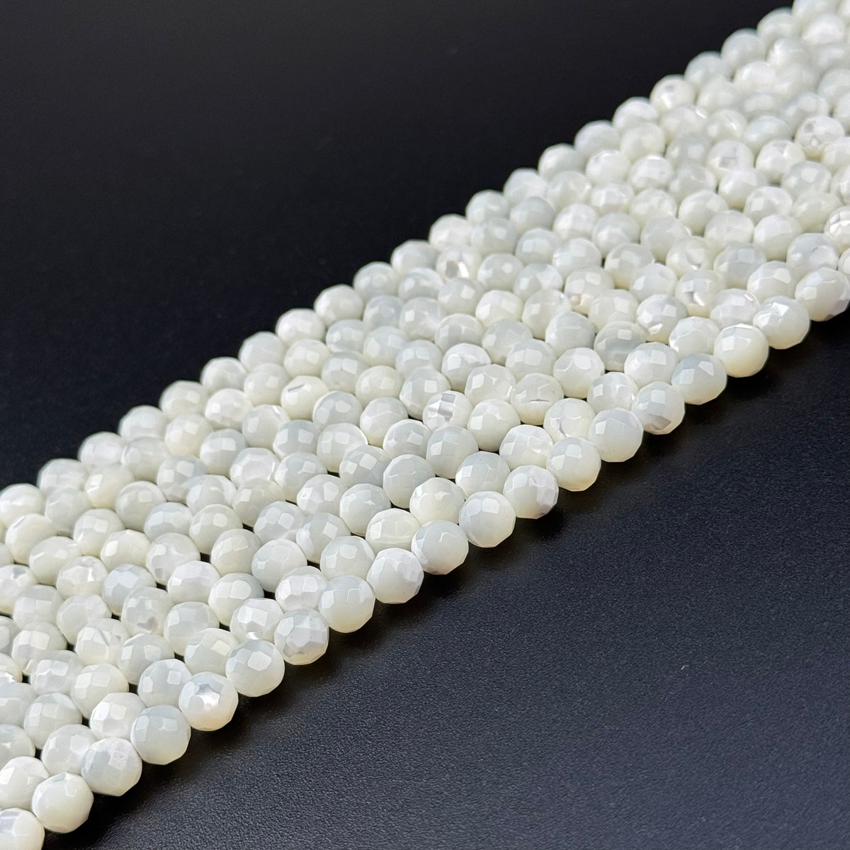 White Mother of Pearls Faceted Round Beads