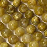 Golden Rutilated Quartz Polished Round Beads (AAAA Quality)