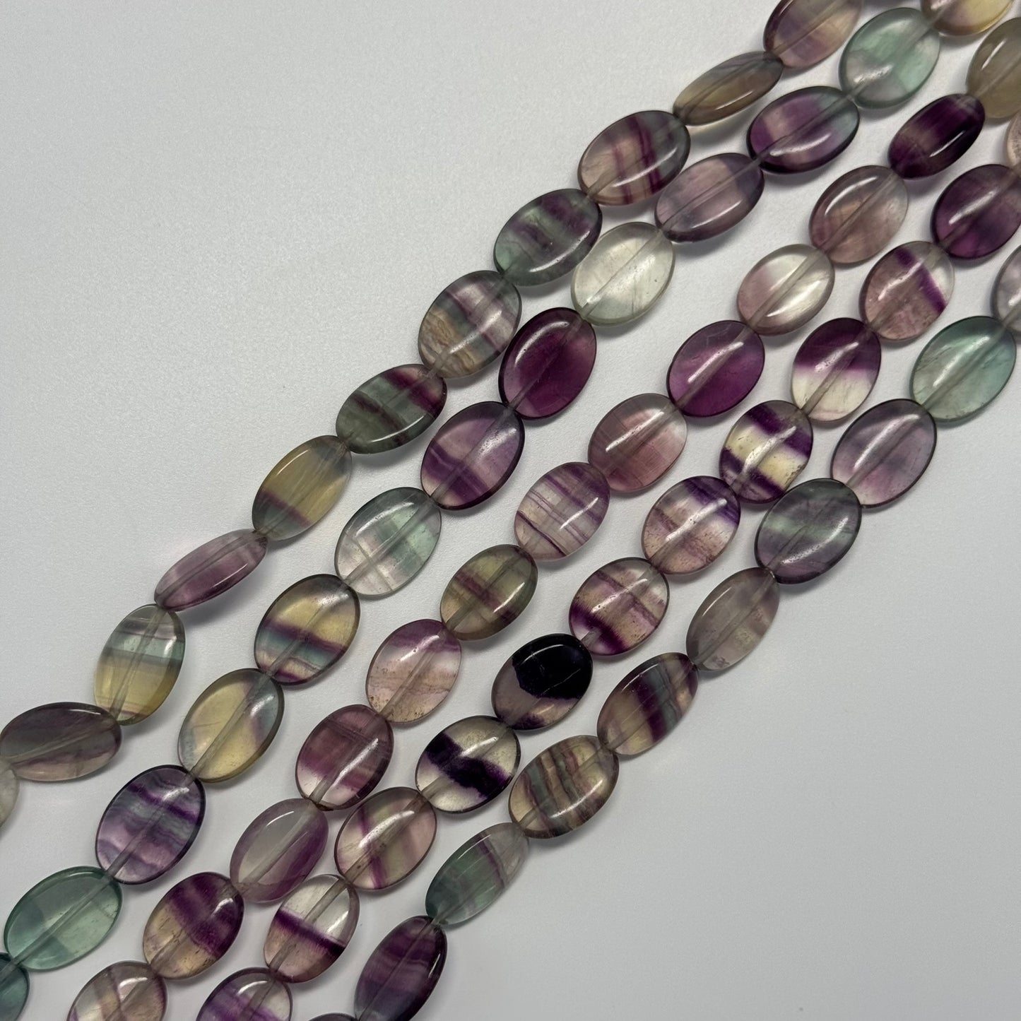 Rainbow Fluorite Polished Oval Gemsotne Beads - Green Based