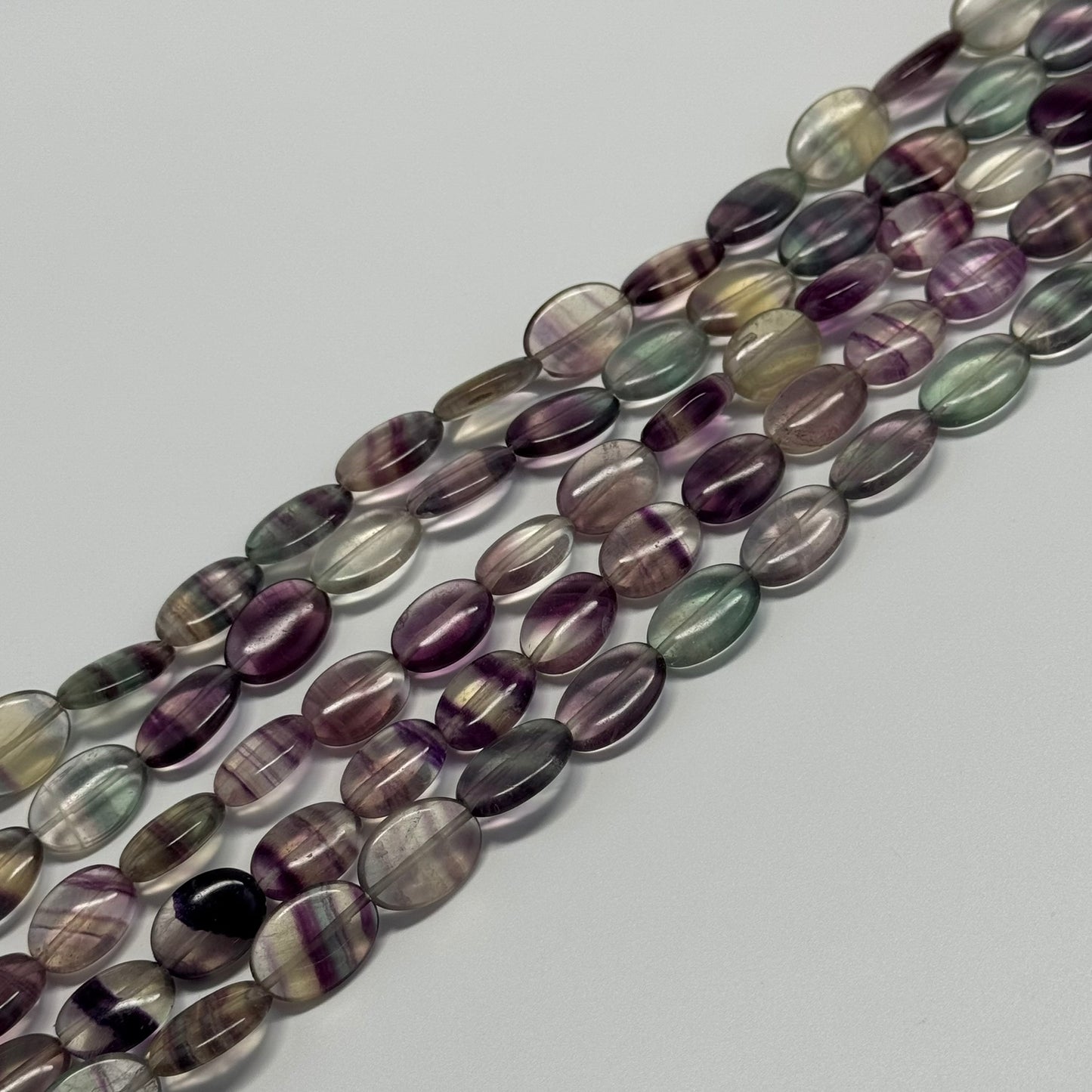 Rainbow Fluorite Polished Oval Gemsotne Beads - Green Based