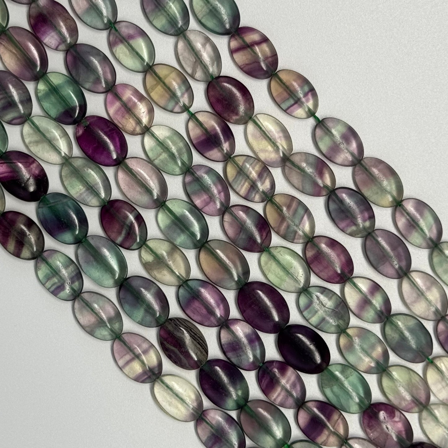 Rainbow Fluorite Polished Oval Gemsotne Beads - Green Based