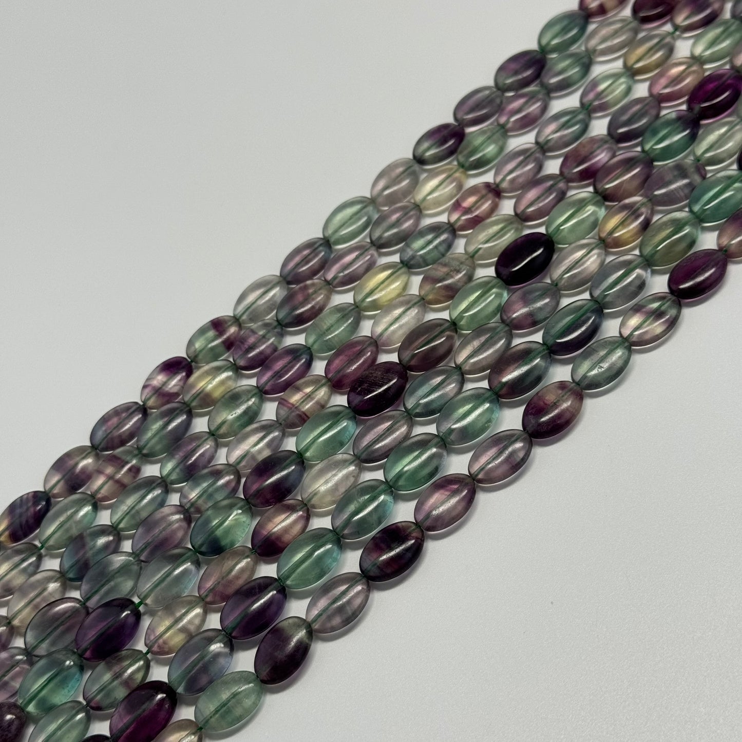 Rainbow Fluorite Polished Oval Gemsotne Beads - Green Based