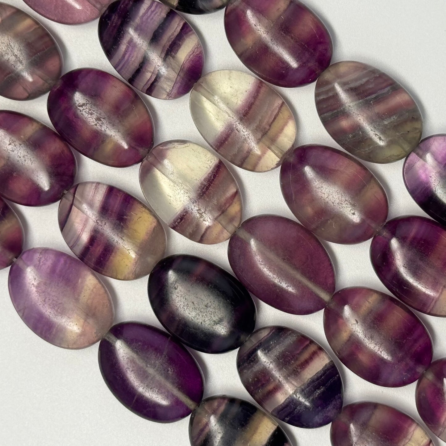 Rainbow Fluorite Polished Oval Gemsotne Beads - Purple Based