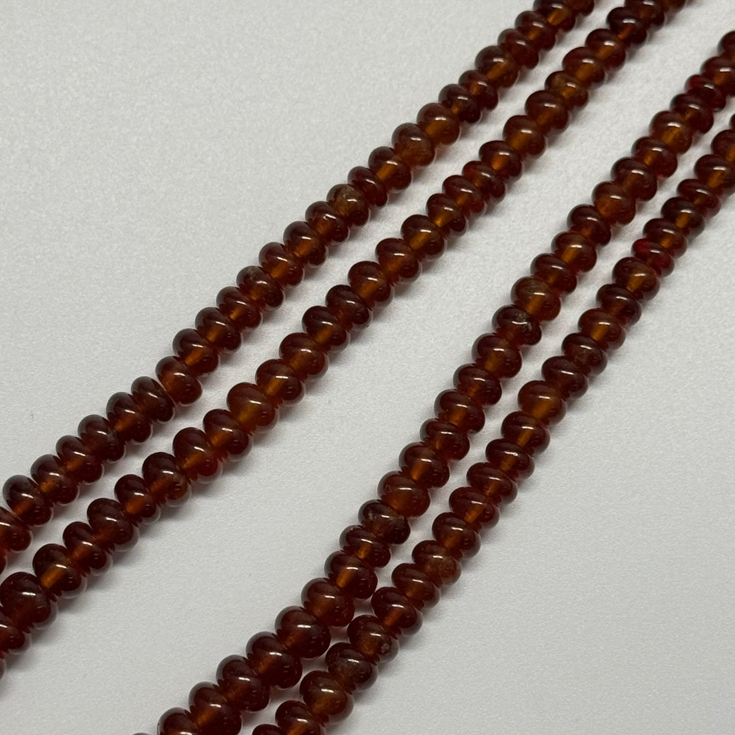 Hessonite Garnet Polished	Rondelle	Gemstone Beads (AAA Quality)