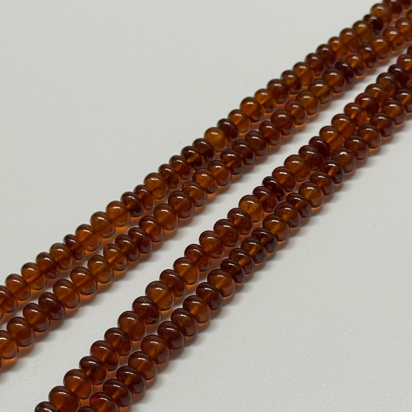 Hessonite Garnet Polished	Rondelle	Gemstone Beads (AAA Quality)