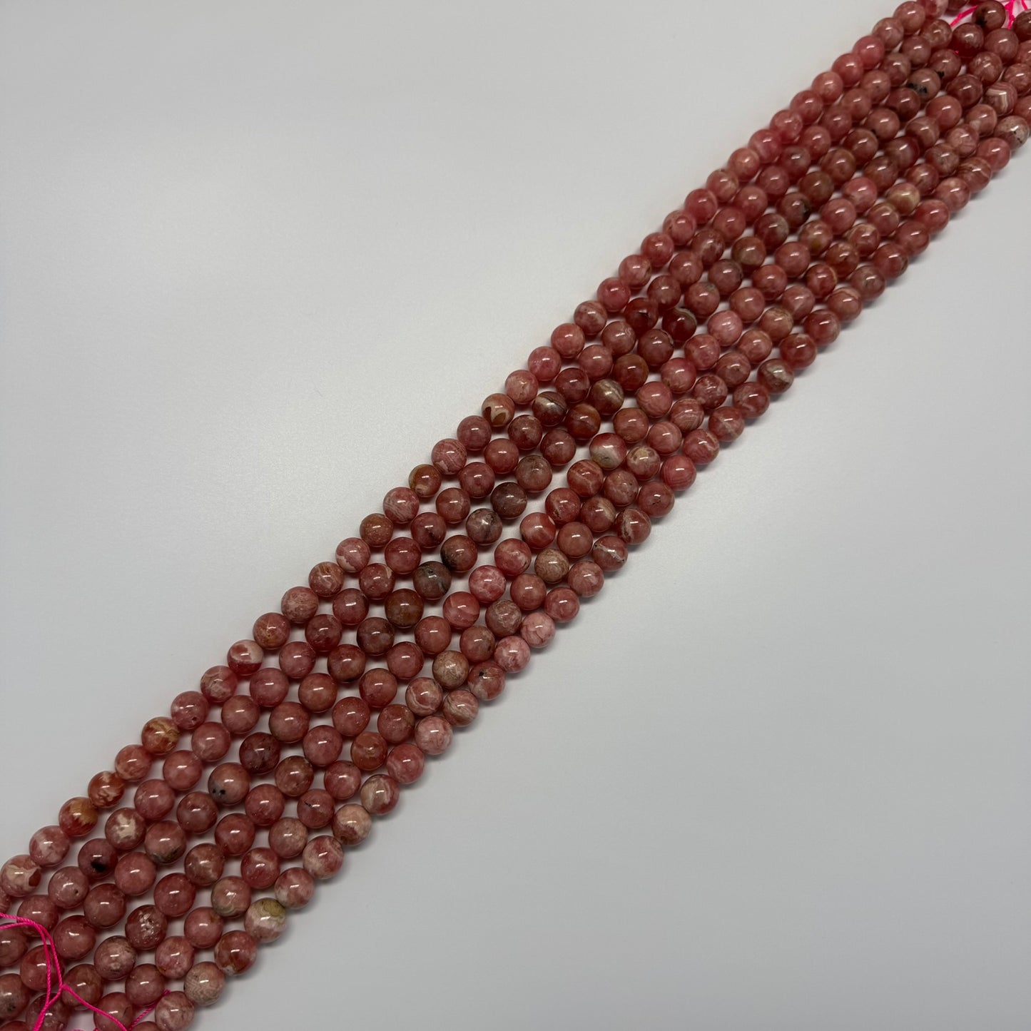Rhodochrosite Polished Round Beads - (AAA Quality)