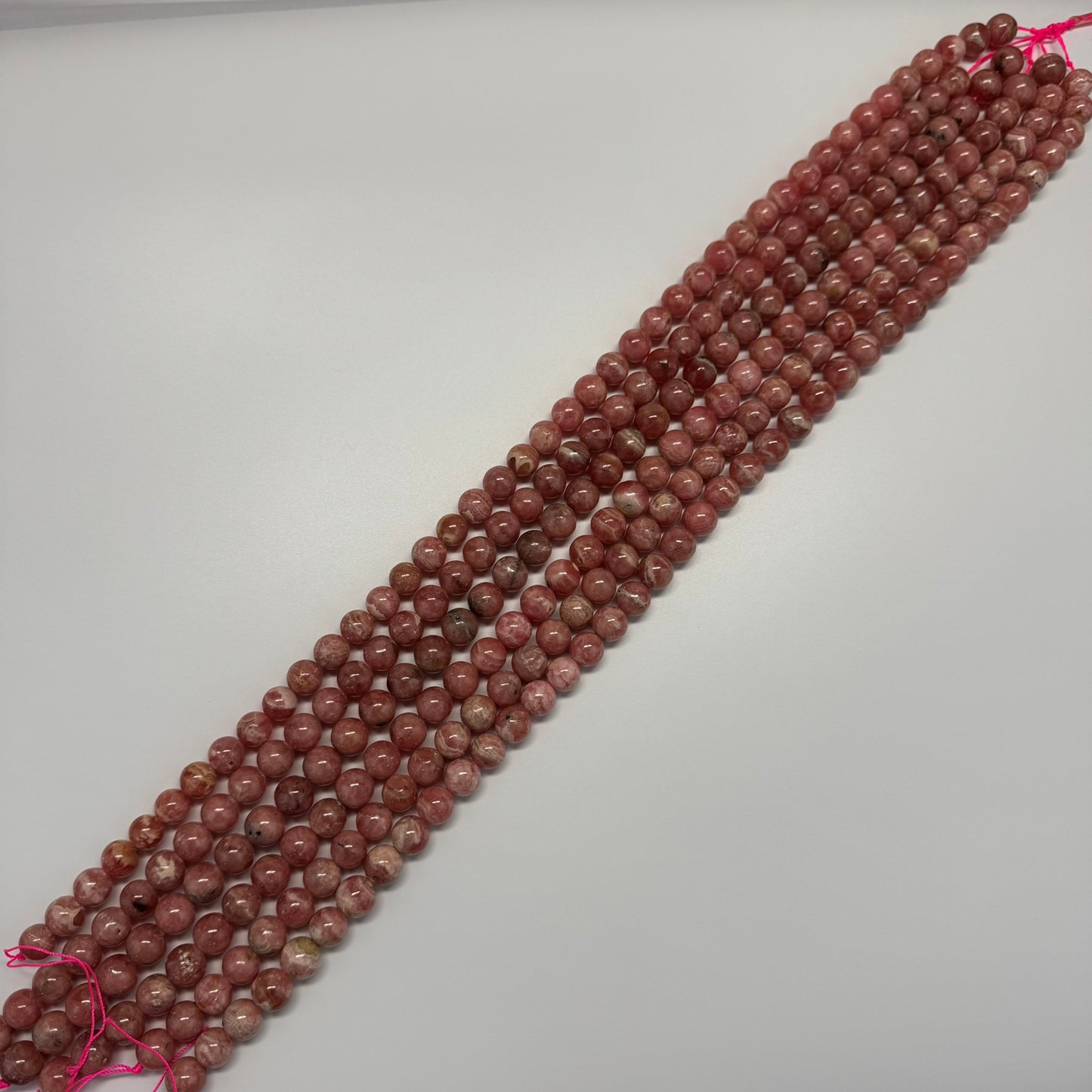 Rhodochrosite Polished Round Beads - (AAA Quality)