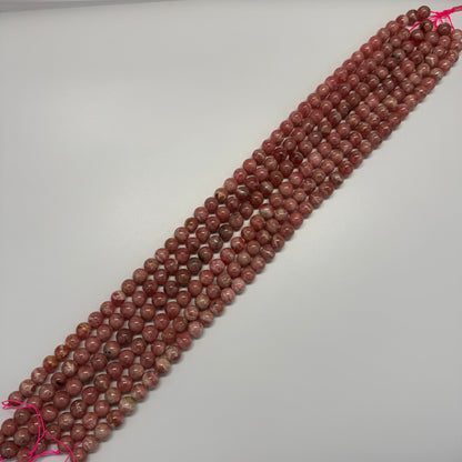 Rhodochrosite Polished Round Beads - (AAA Quality)