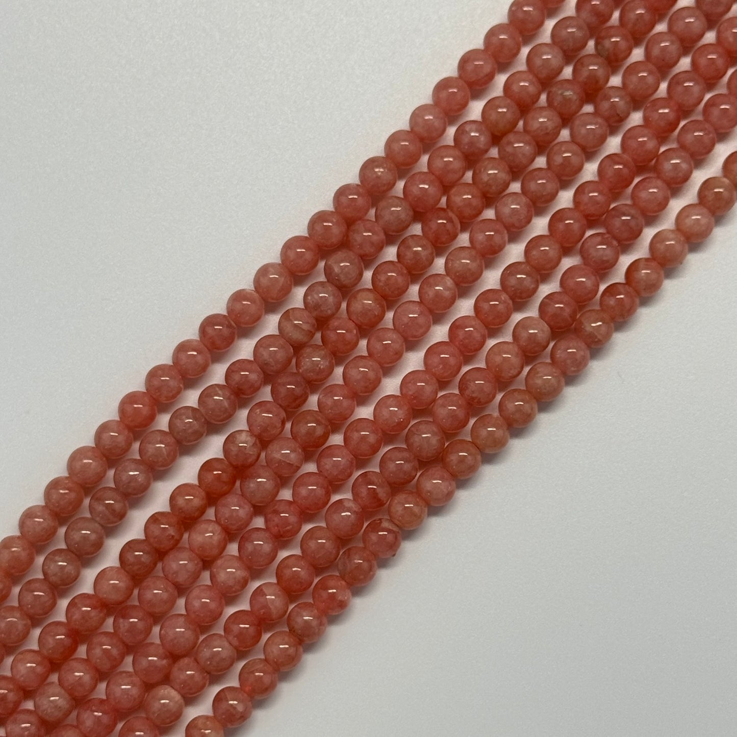 Rhodochrosite Polished Round Beads - (AAA Quality)