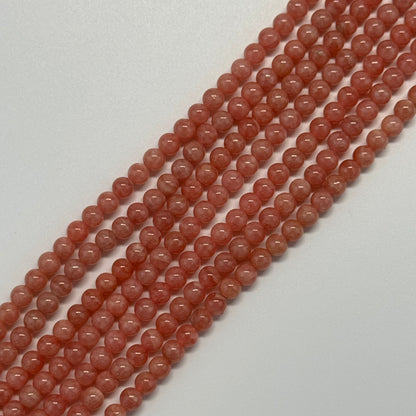 Rhodochrosite Polished Round Beads - (AAA Quality)