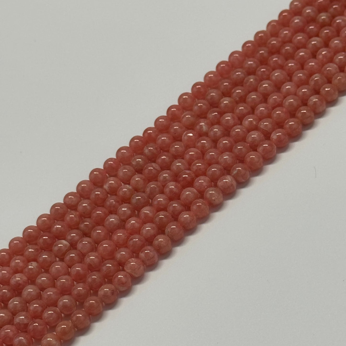 Rhodochrosite Polished Round Beads - (AAA Quality)