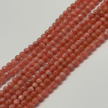 Rhodochrosite Polished Round Beads - (AAA Quality)
