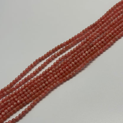 Rhodochrosite Polished Round Beads - (AAA Quality)