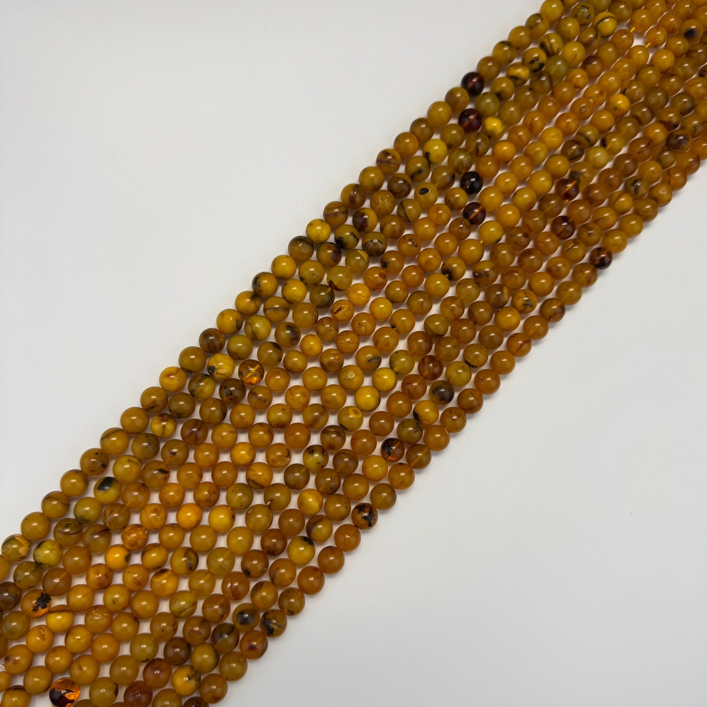 Amber Polished Round Beads (AA Quality)