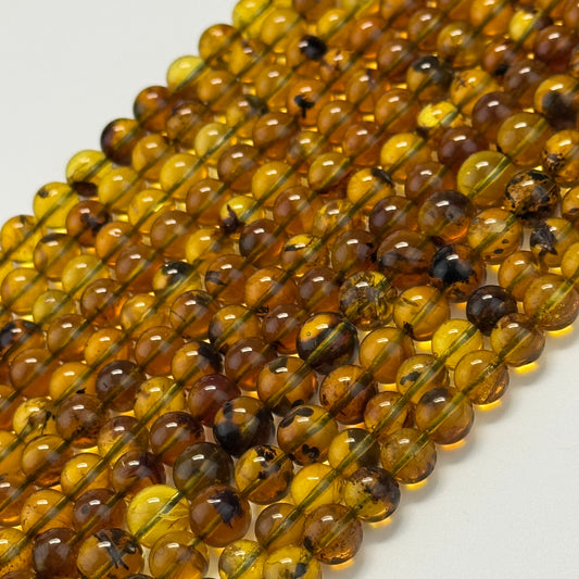 Amber Polished Round Beads (AAA Quality)