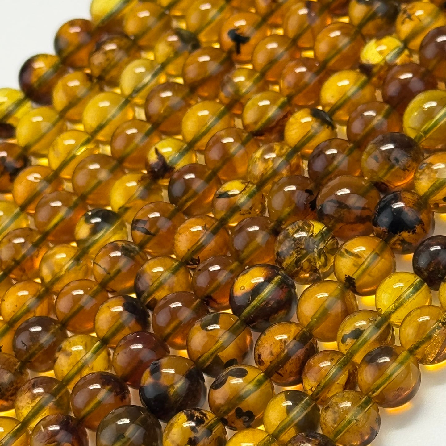 Amber Polished Round Beads (AAA Quality)