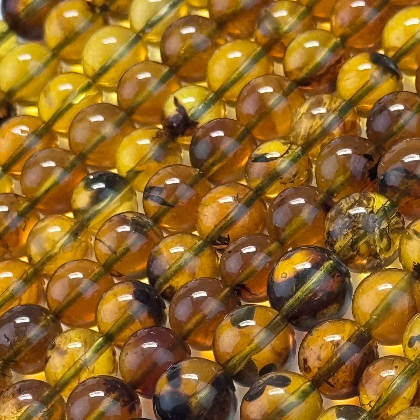 Amber Polished Round Beads (AAA Quality)