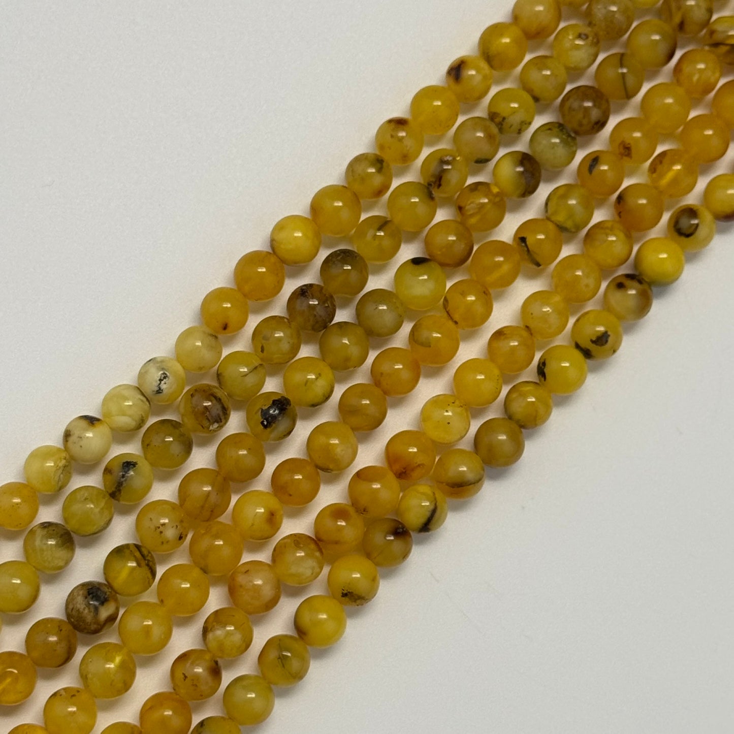 Amber Polished Round Beads (AA Quality)