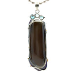 Titanium-Coated Druzy Pendant with Three Blue Zircons