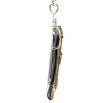Titanium-Coated Druzy Pendant with Three Blue Zircons
