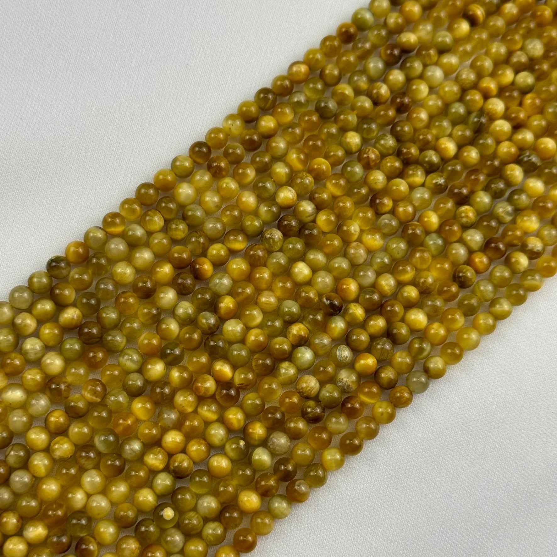 Golden Tiger's Eye Polished Round Beads image 0