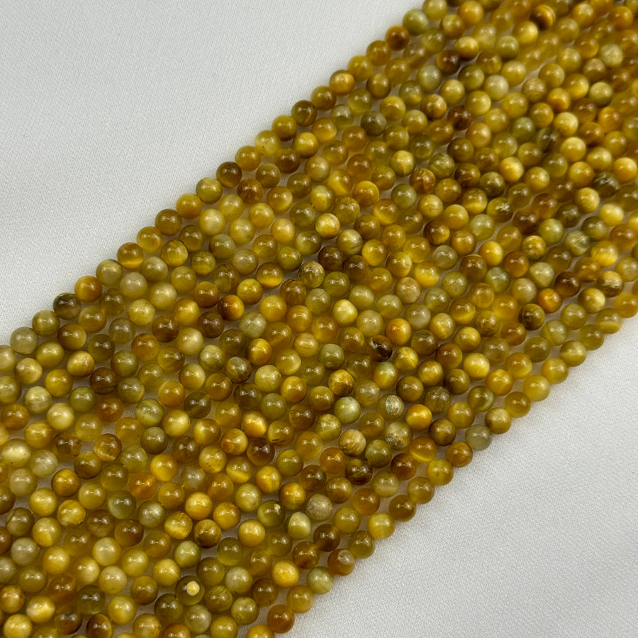 Golden Tiger's Eye Polished Round Beads image 0