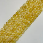 Golden Cat's eye Calcite Polished Round Beads image 3