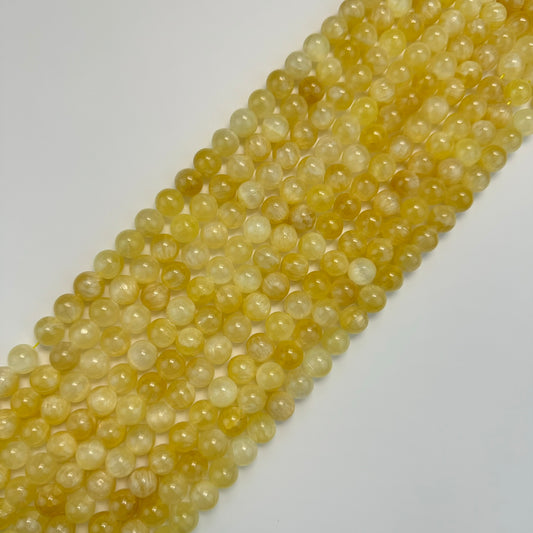 Golden Cat's eye Calcite Polished Round Beads
