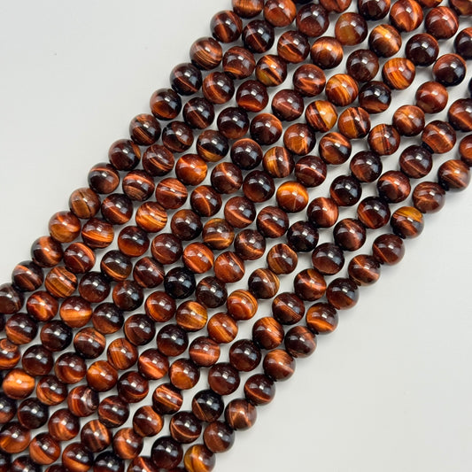 Red Tiger's Eye Polished Round Beads image 0